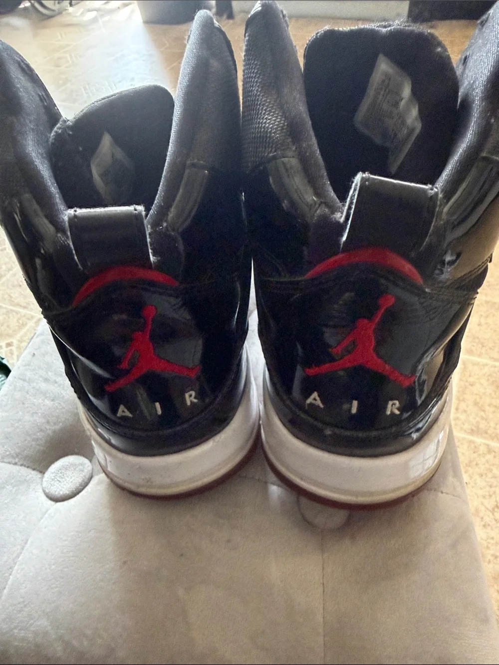 Jordan Black High-Top Sneakers with Red Highlights